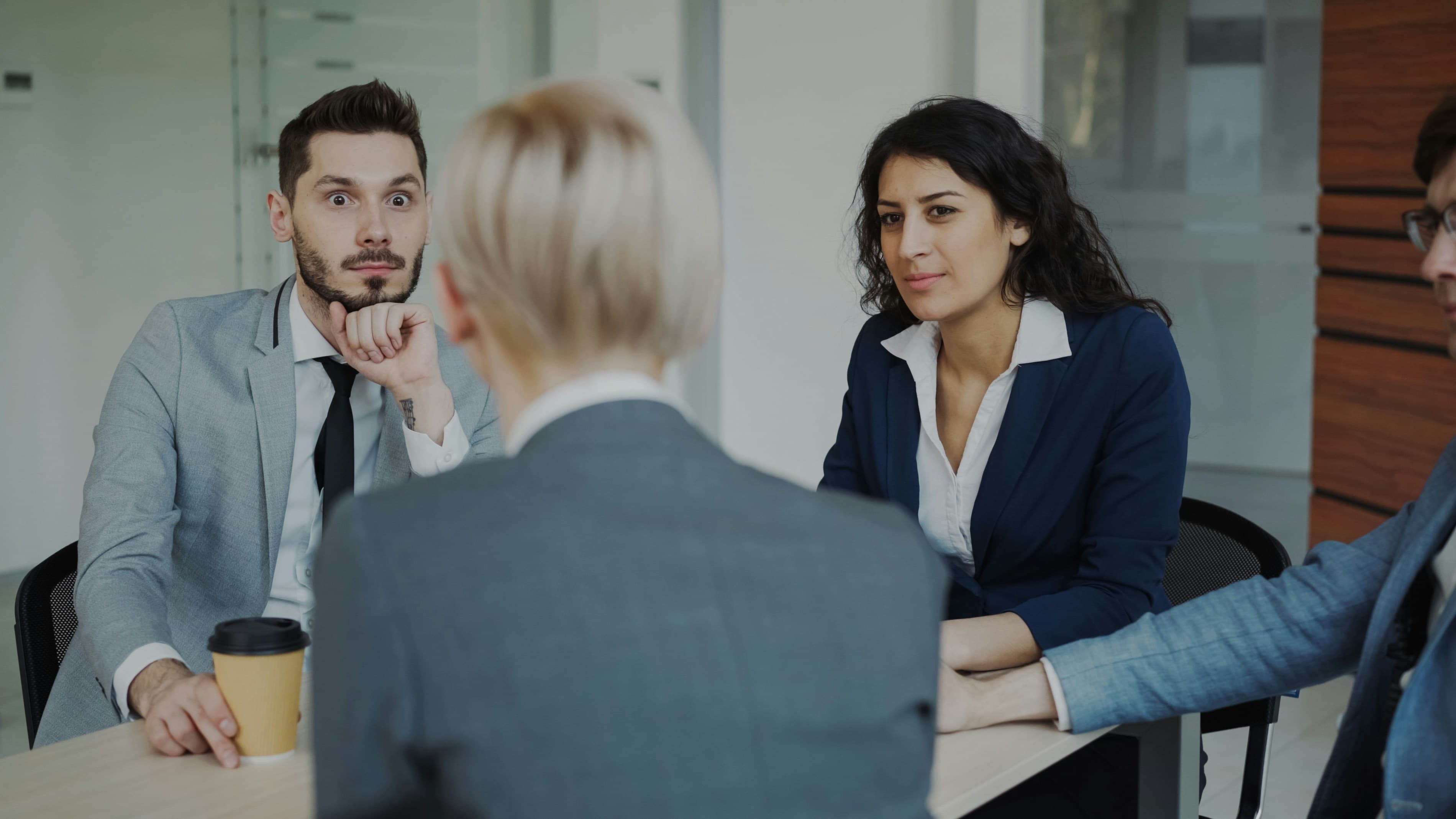 Small business owners reviewing growth plans together