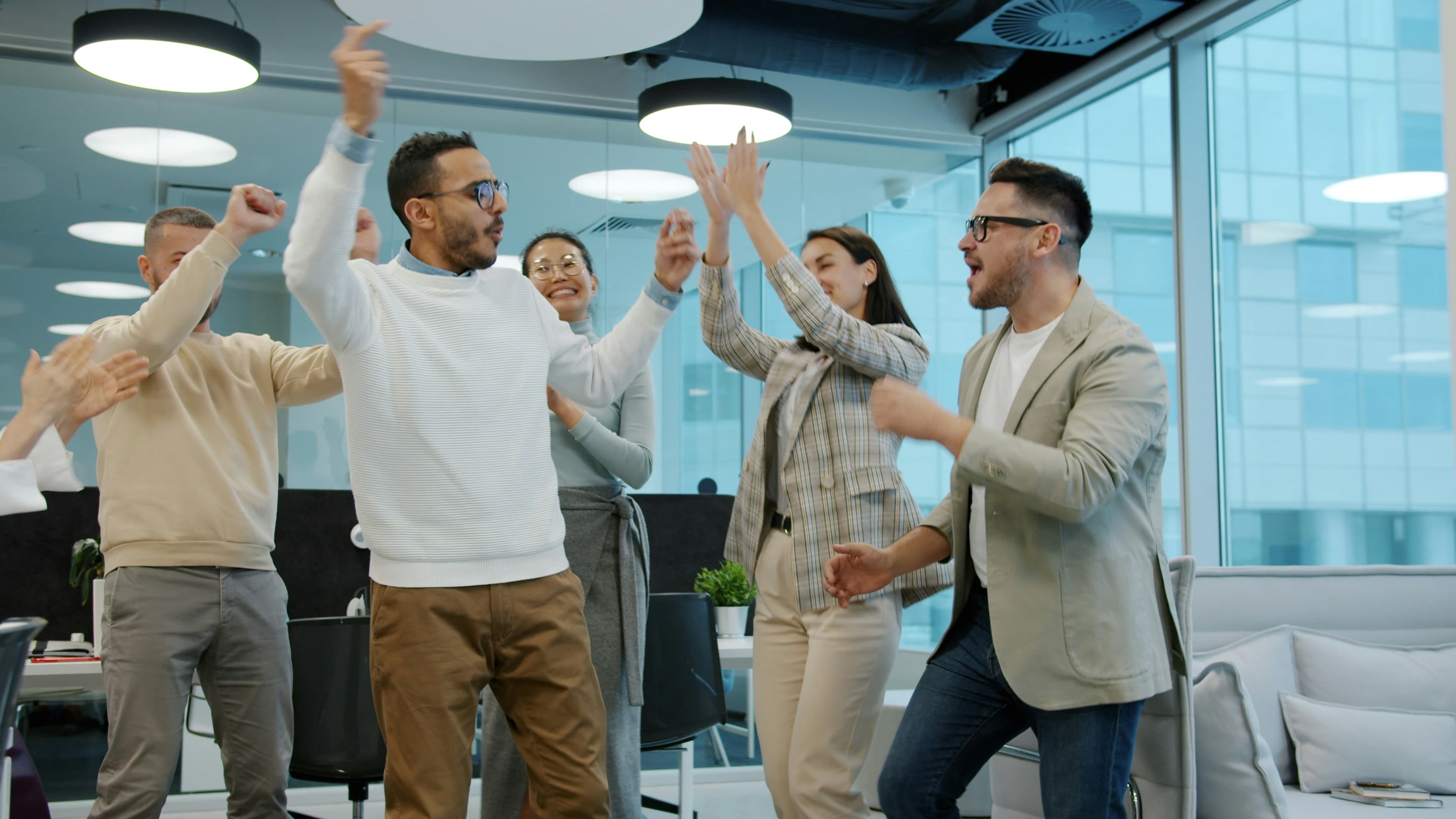 Team celebrating a business win together